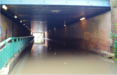 Overstroming in tunnel aan de Veenweg